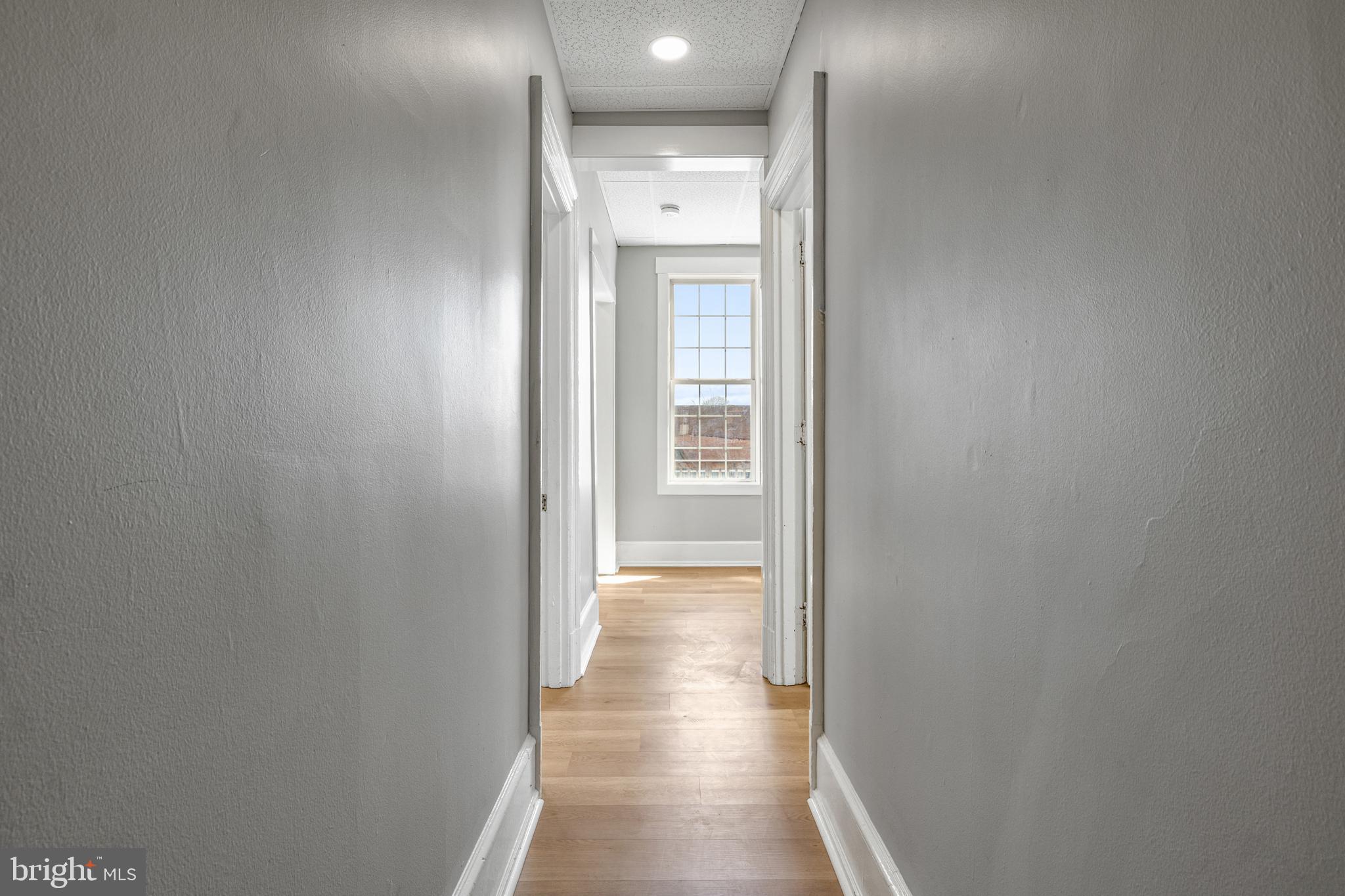 125 North George Street York, PA 17401 - Photo 25 of 56 a view of a hallway with wooden floor