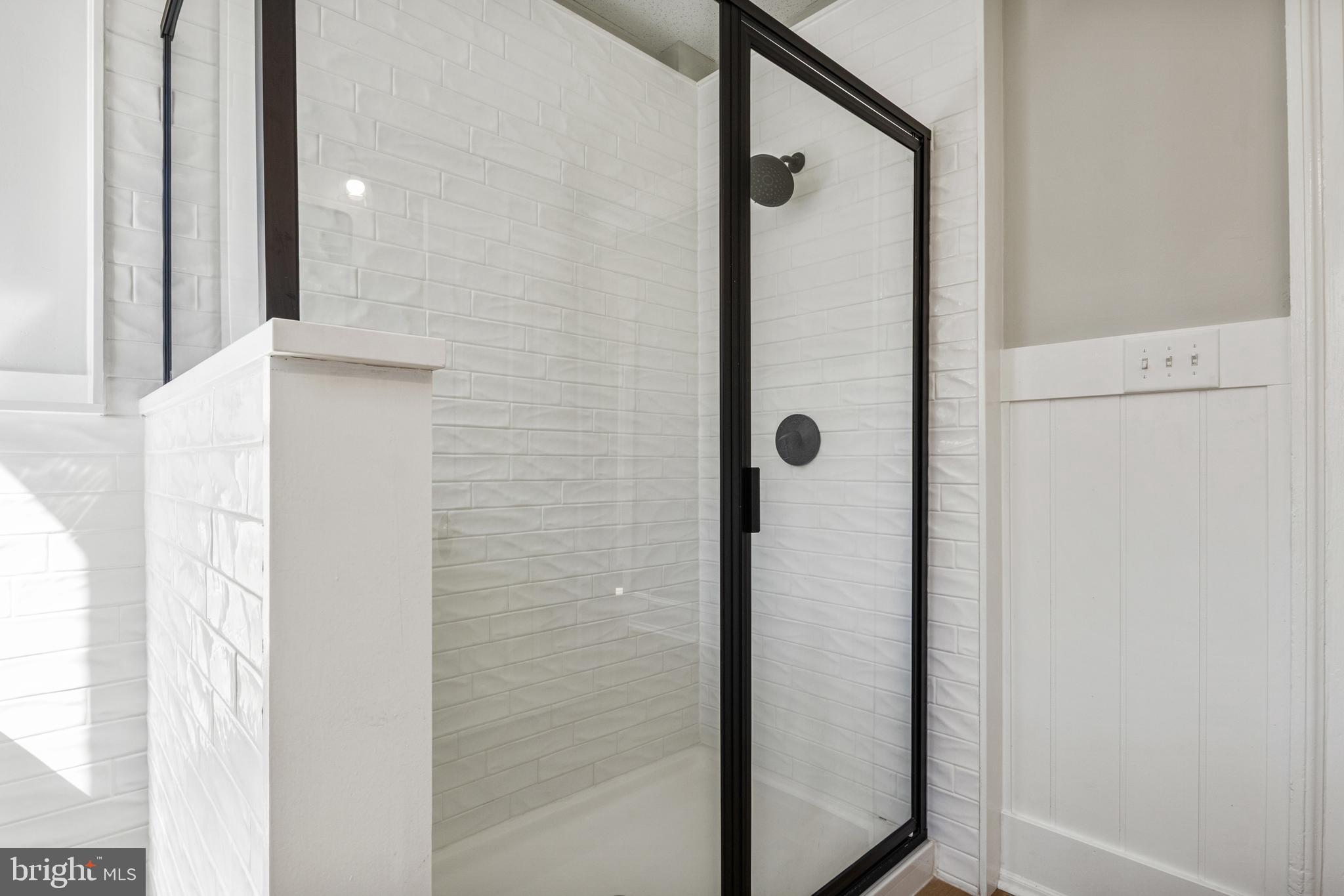 125 North George Street York, PA 17401 - Photo 28 of 56 a bathroom with a shower