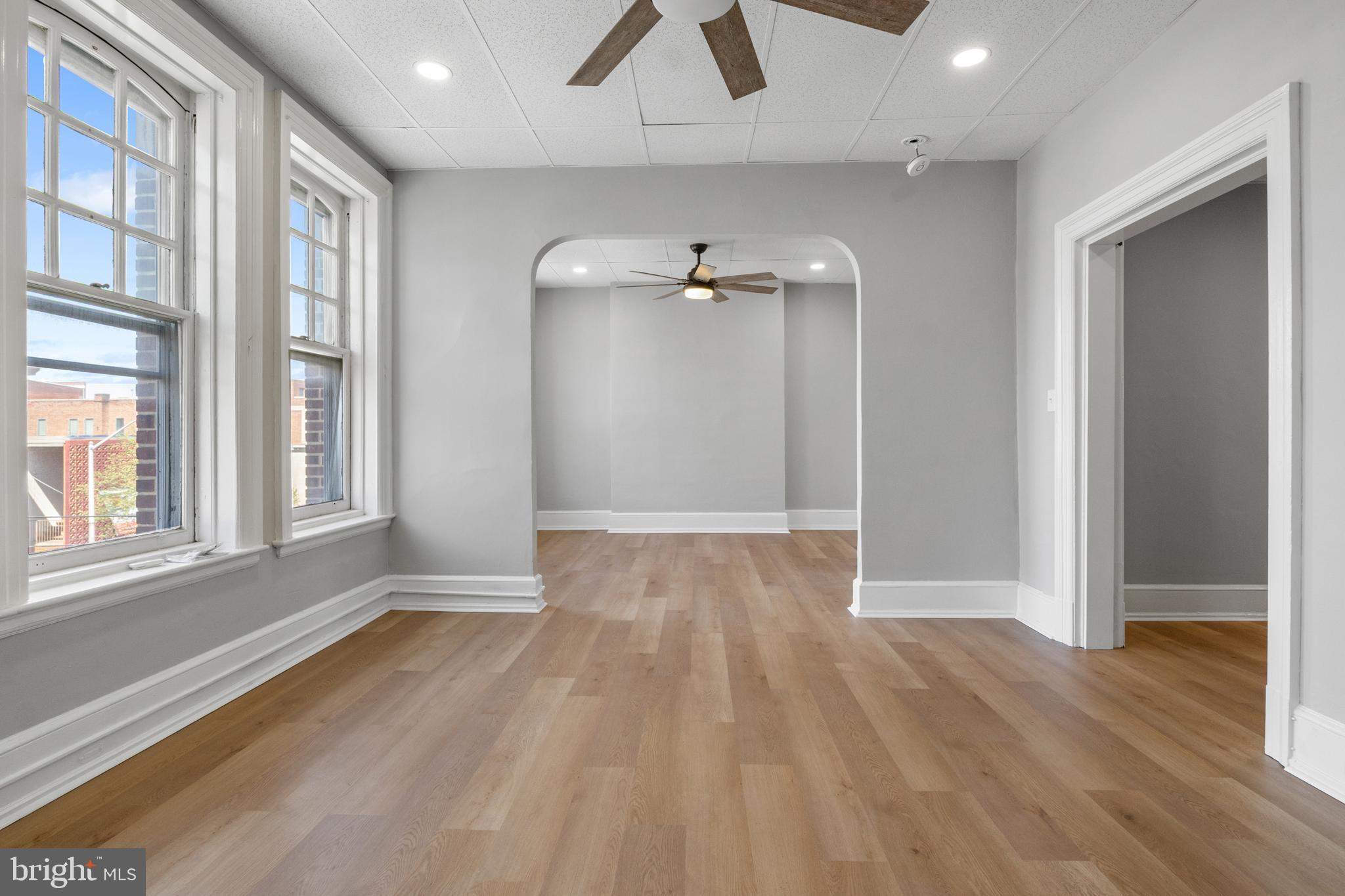 125 North George Street York, PA 17401 - Photo 29 of 56 wooden floor in an empty room with a window
