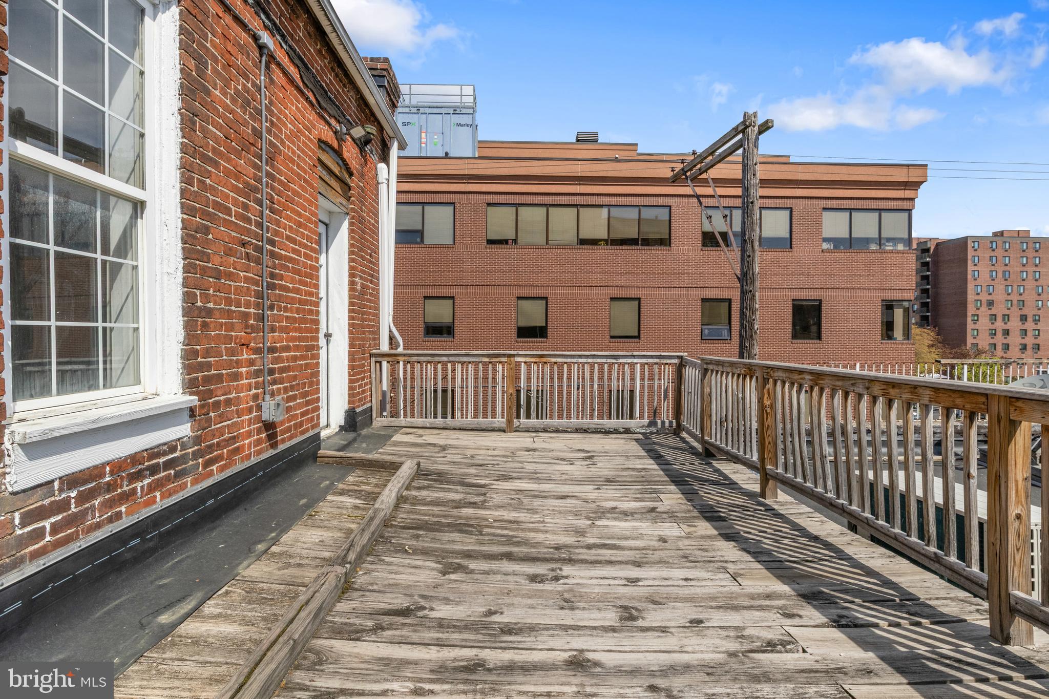 125 North George Street York, PA 17401 - Photo 33 of 56 a view of a brick building with many windows