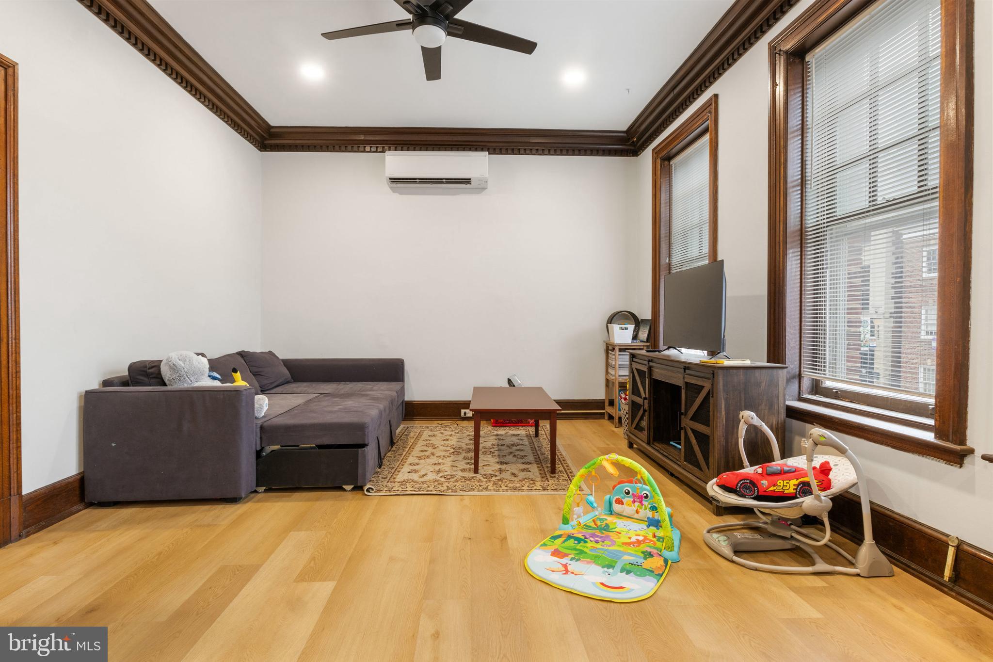 125 North George Street York, PA 17401 - Photo 42 of 56 a living room with furniture and a window