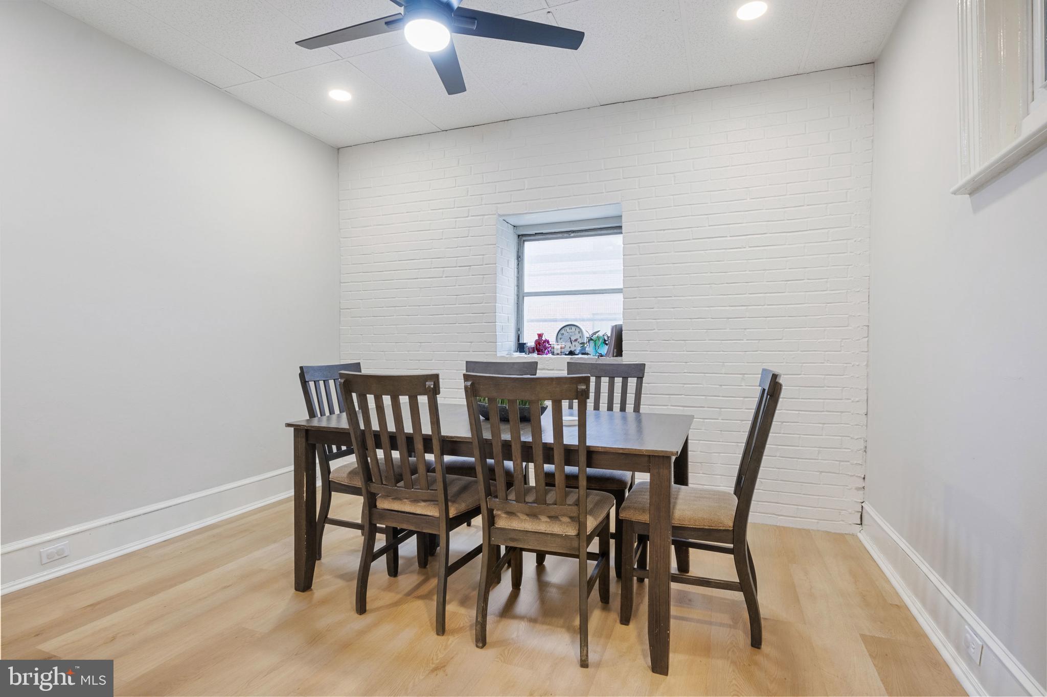 125 North George Street York, PA 17401 - Photo 46 of 56 a view of a dining room with furniture and wooden floor