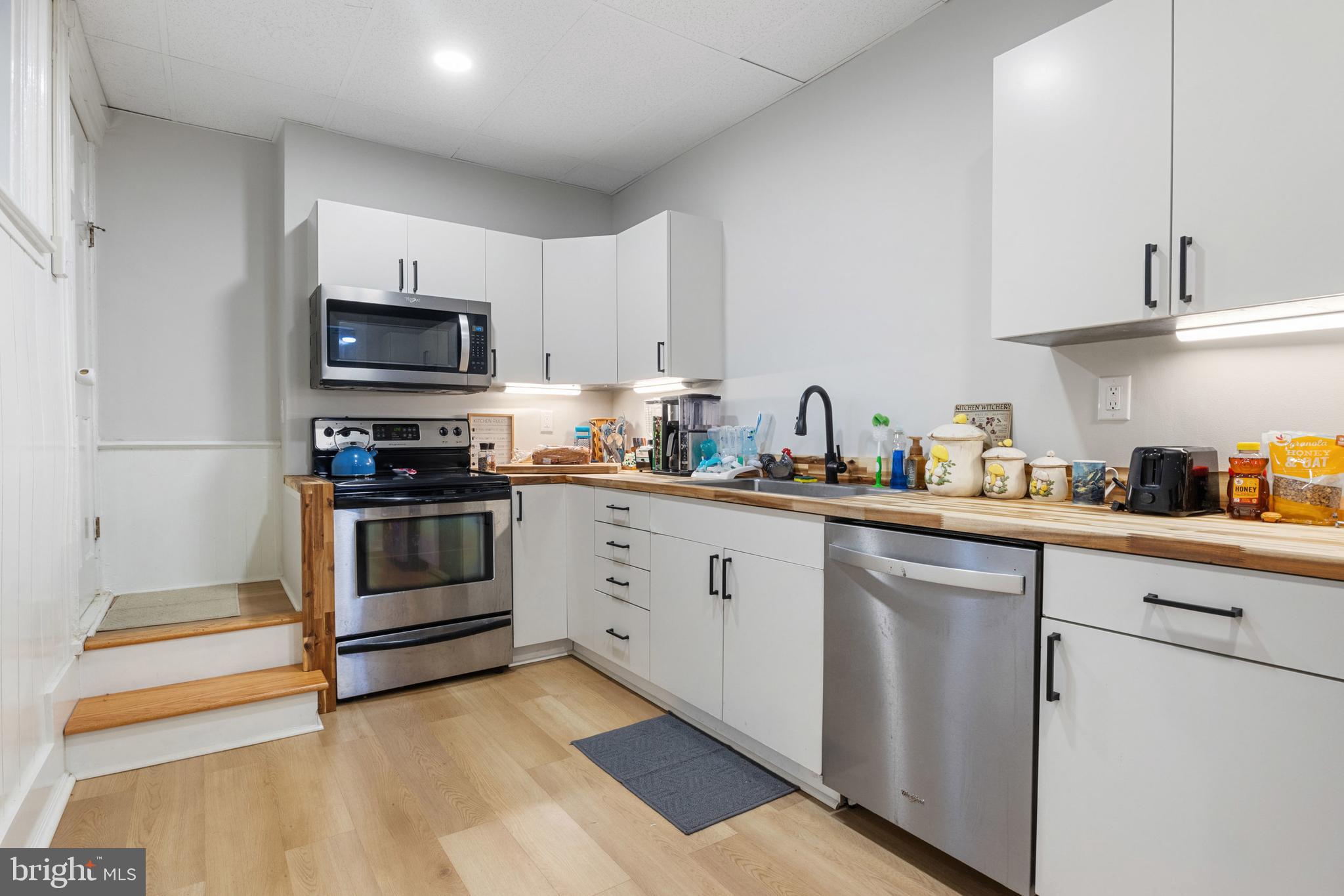 125 North George Street York, PA 17401 - Photo 48 of 56 a kitchen with appliances a sink and cabinets