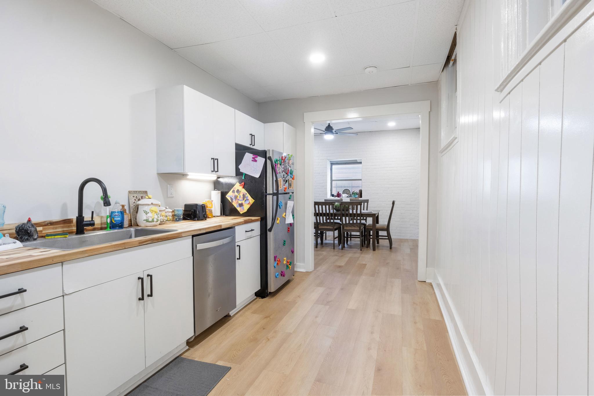 125 North George Street York, PA 17401 - Photo 49 of 56 a kitchen with white cabinets and sink