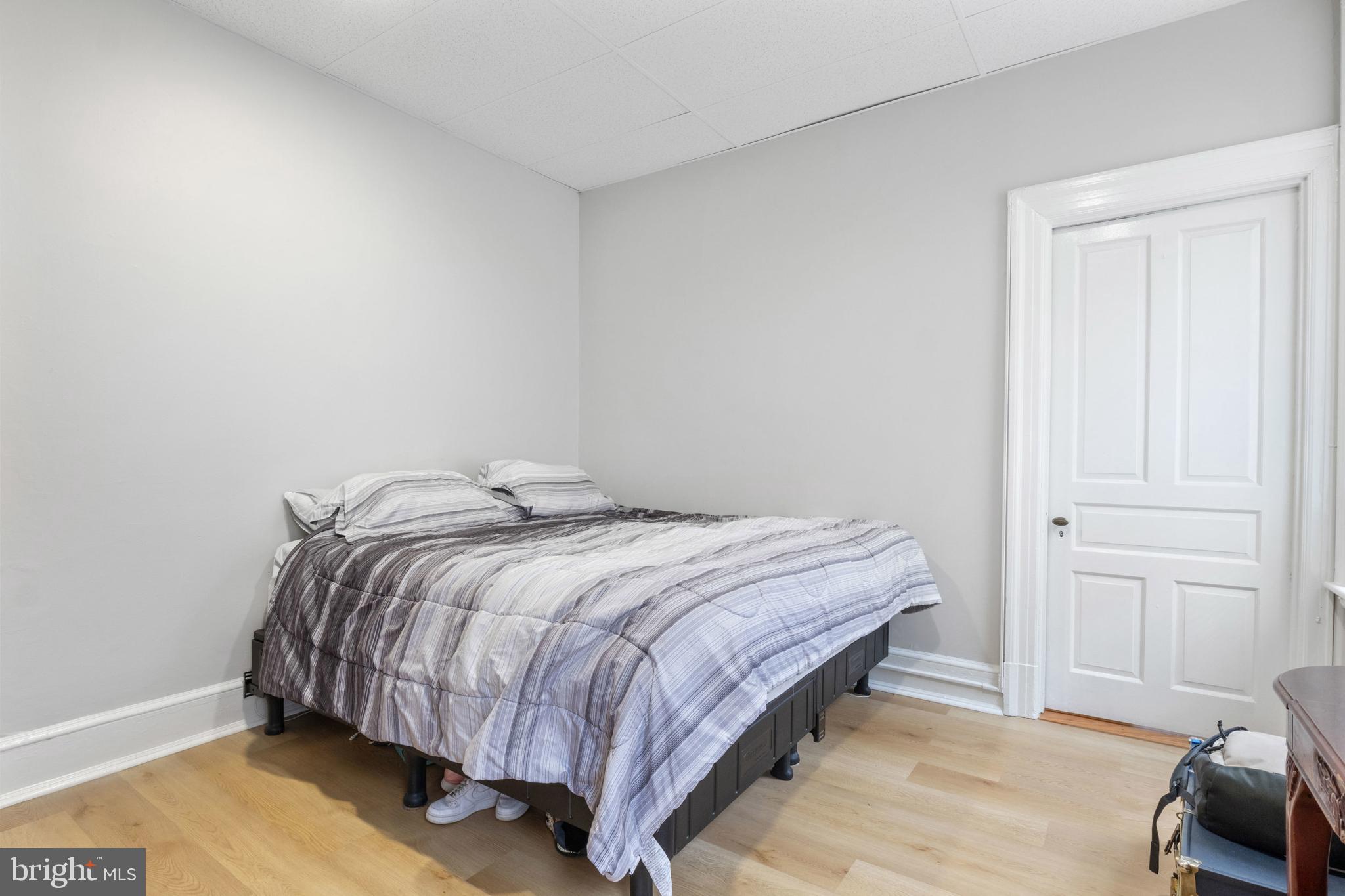 125 North George Street York, PA 17401 - Photo 51 of 56 a bedroom with a bed and chair