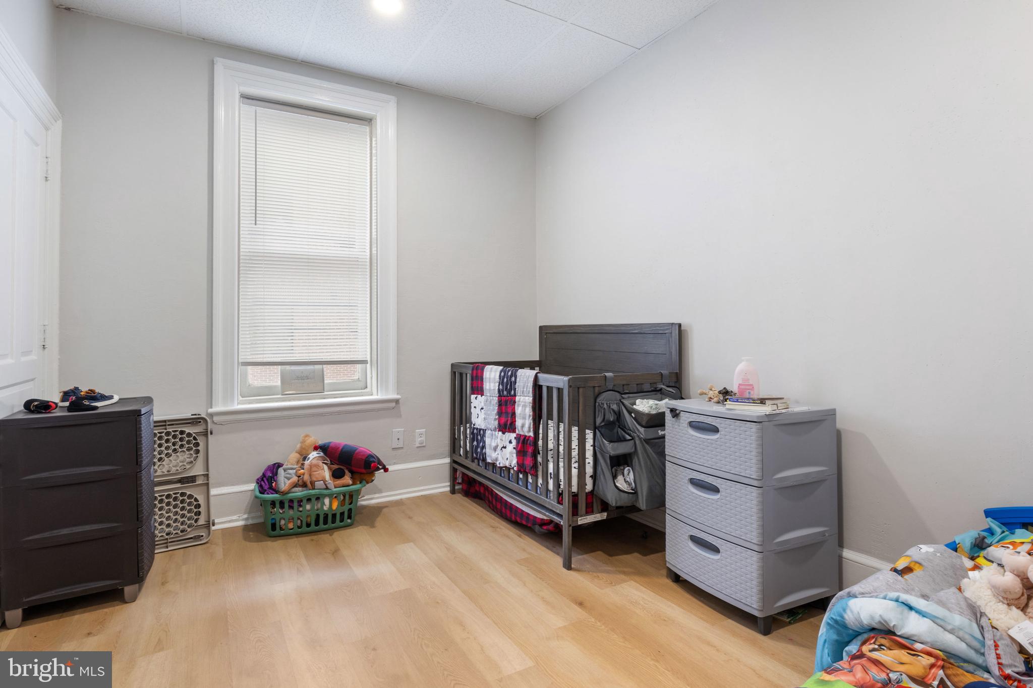 125 North George Street York, PA 17401 - Photo 53 of 56 a bedroom with a bed and furniture