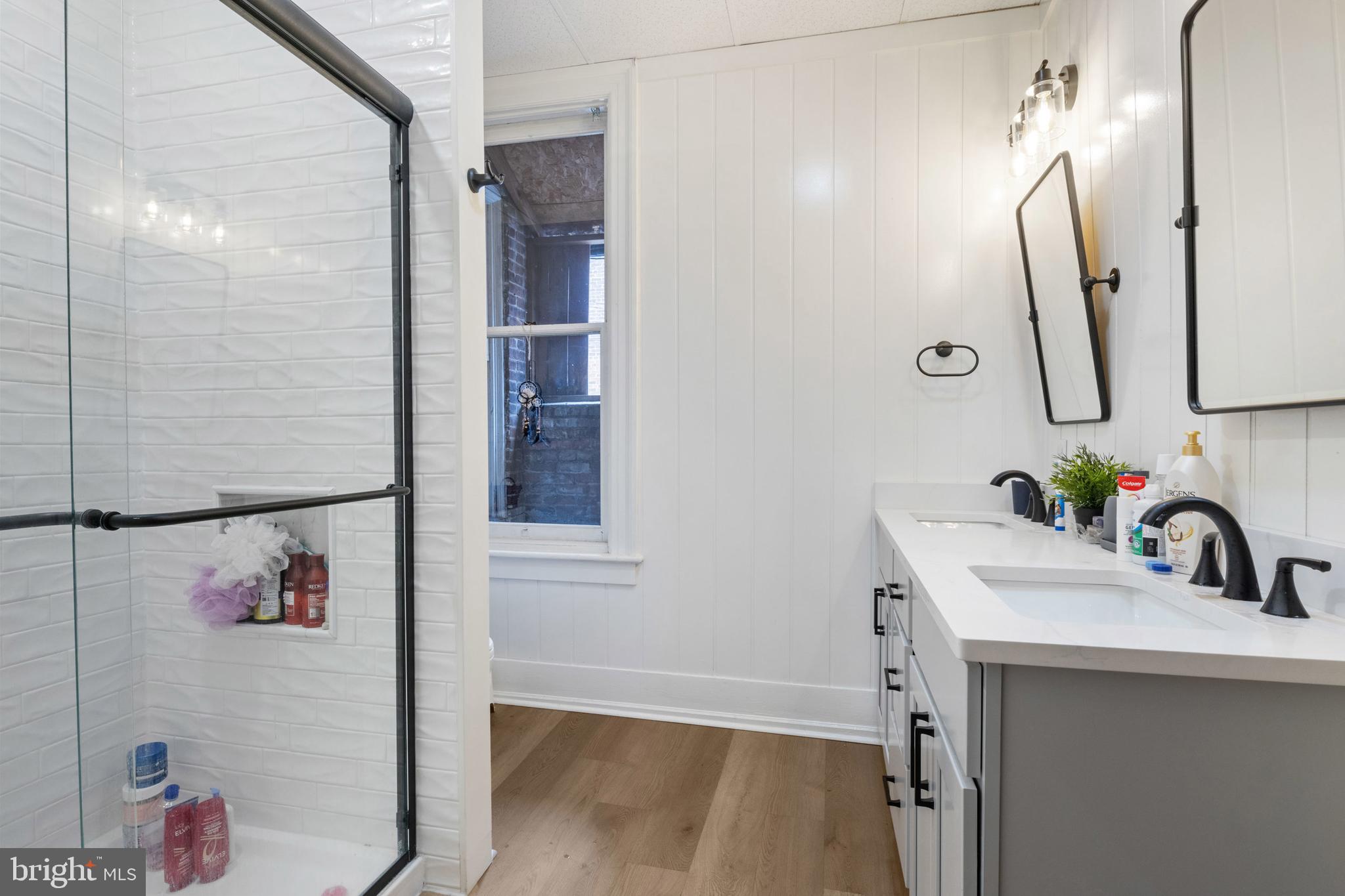 125 North George Street York, PA 17401 - Photo 54 of 56 a bathroom with a sink and mirror