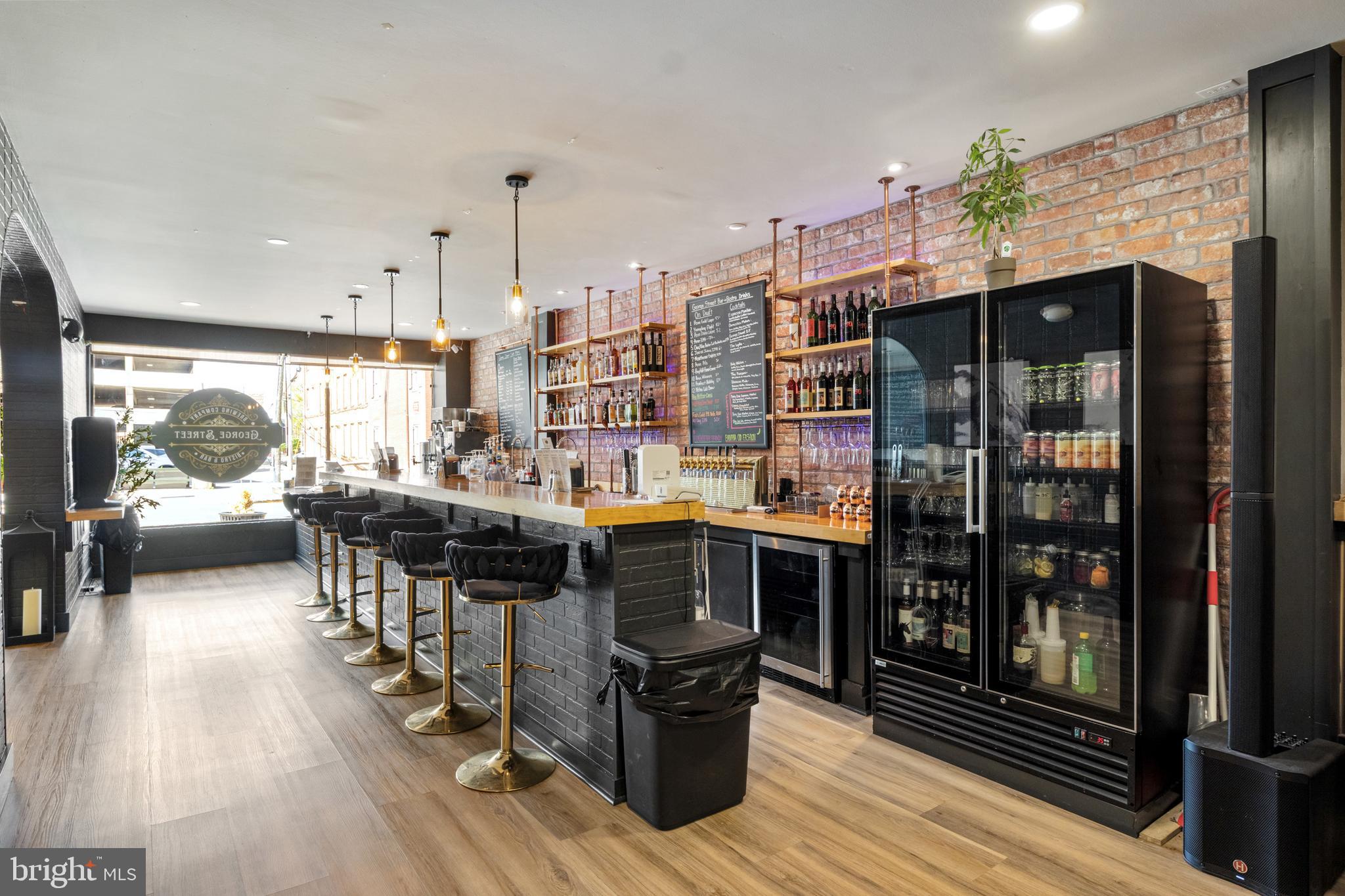 125 North George Street York, PA 17401 - Photo 8 of 56 a open kitchen with stainless steel appliances granite countertop a stove and refrigerator