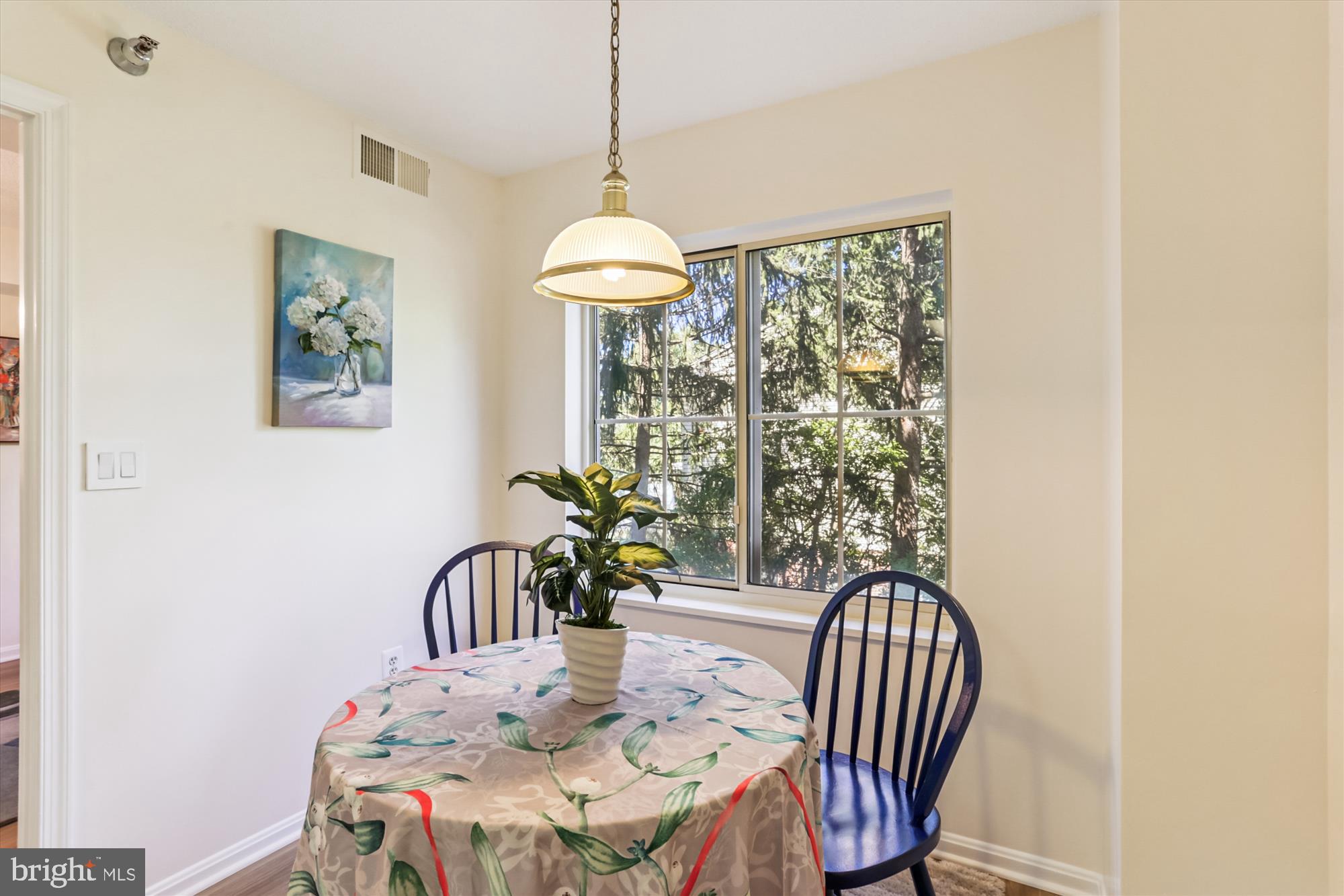 14801 Pennfield Circle, Unit 210 Silver Spring, MD 20906 - Photo 4 of 39 a view of a dining room with furniture window and outside view