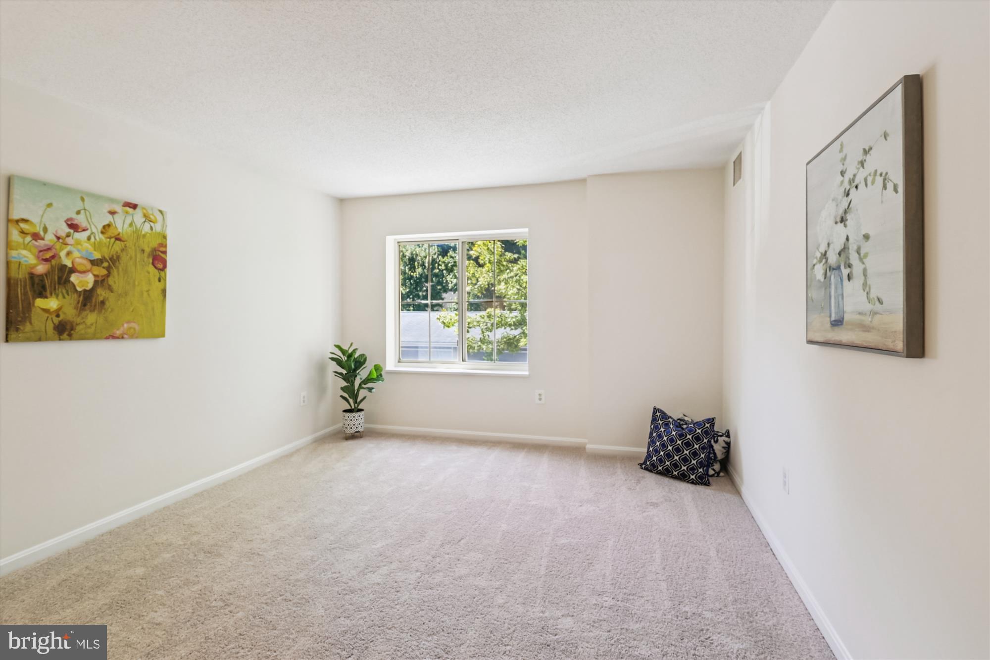 14801 Pennfield Circle, Unit 210 Silver Spring, MD 20906 - Photo 5 of 39 a view of an empty room with a window