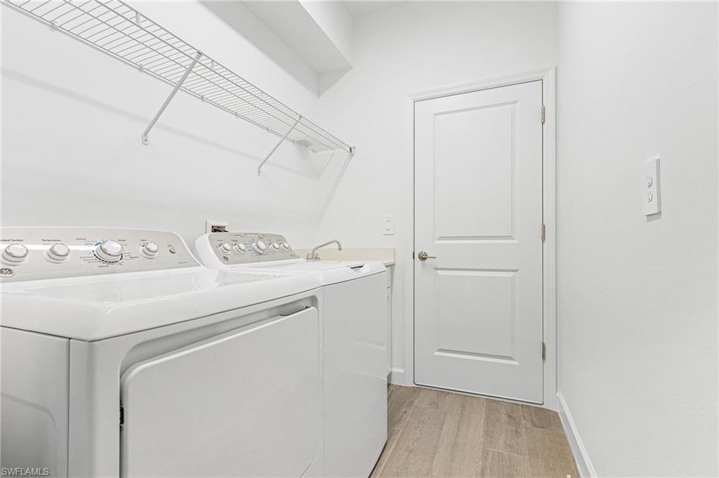 20662 Greenwich Place Estero, FL 33928 - Photo 16 of 26 a utility room with dryer and washer