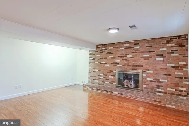 a living room with a fireplace