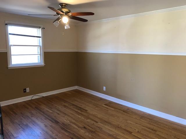 1492 Dolan Road Nashville, TN 37218 - Photo 2 of 6 Living Room with Chair Railing and Hardwood Floors