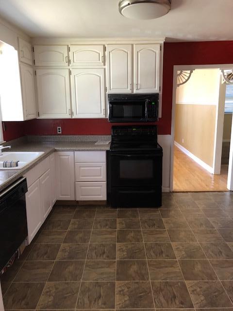1492 Dolan Road Nashville, TN 37218 - Photo 3 of 6 Kitchen w/ Smooth Top Stove, Above Stove Microwave