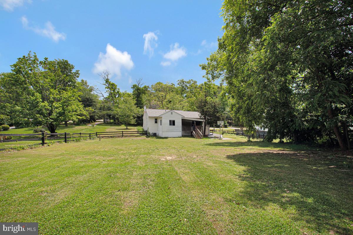 976 Shore Acres Road Arnold, MD 21012 - Photo 32 of 40 a view of a house with a big yard