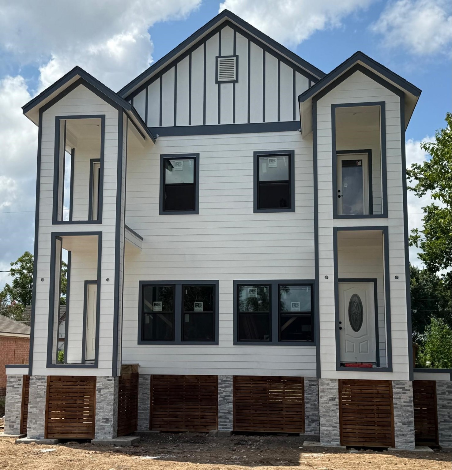5226 Ricky Street Houston, TX 77033 - Photo 11 of 11 a front view of a house with large windows