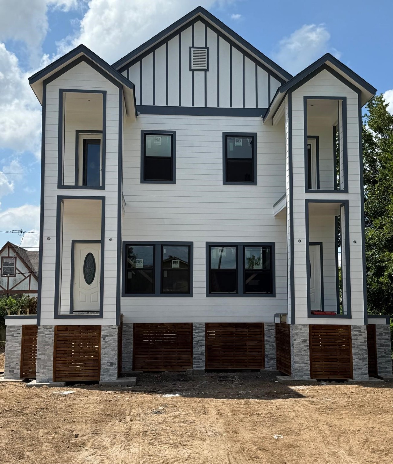 5226 Ricky Street Houston, TX 77033 - Photo 4 of 11 a front view of a house with a yard