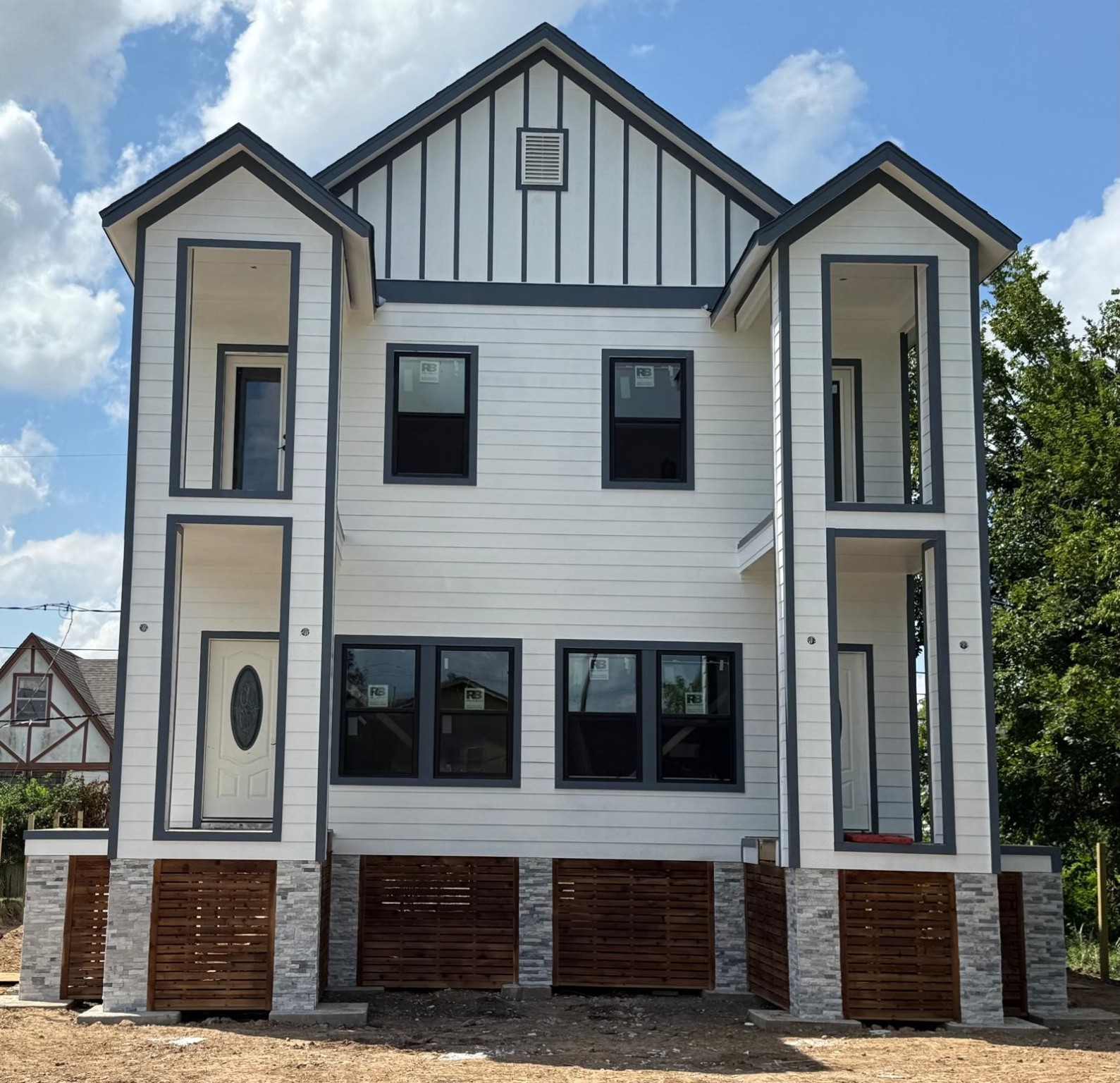5226 Ricky Street Houston, TX 77033 - Photo 10 of 11 a front view of a house with a street