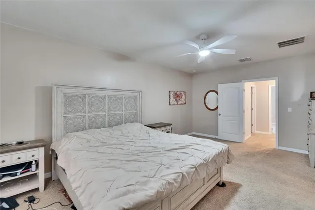 a view of storage and utility room with washer and dryer