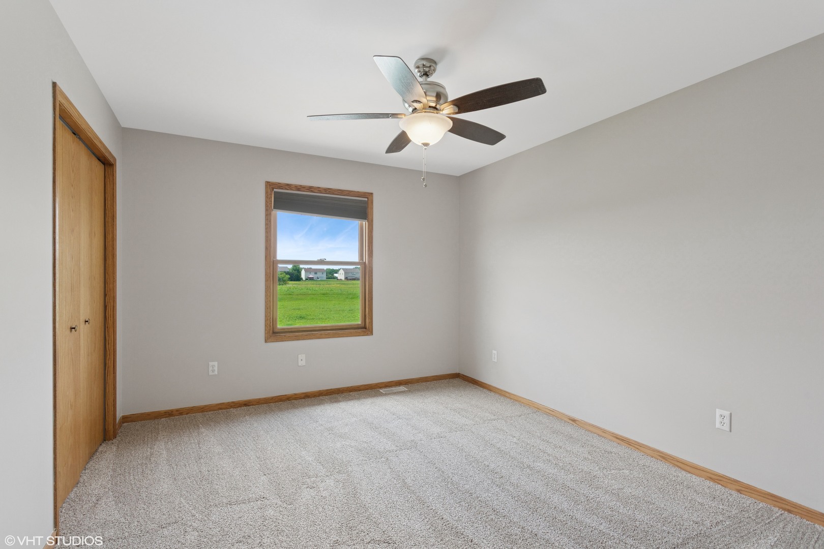2033 Willow Brook Drive Bourbonnais, IL 60914 - Photo 14 of 24 an empty room with a window and a fan
