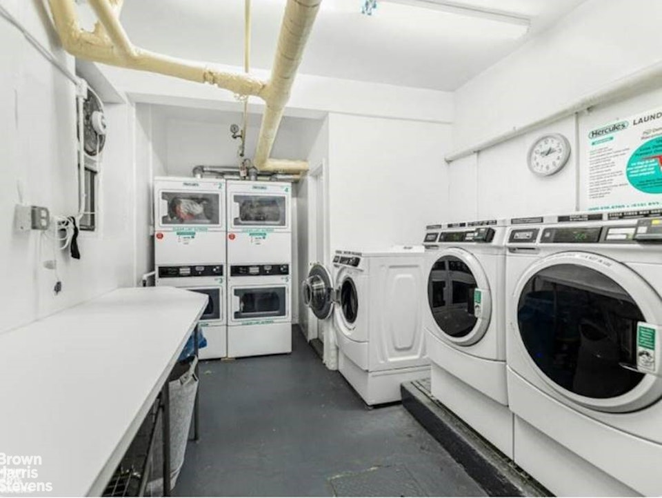 611 West 239th Street, Unit 3F Bronx, NY 10471 - Photo 11 of 12 a utility room with sink dryer and washer