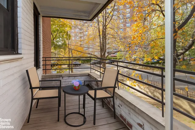 a kitchen with stainless steel appliances granite countertop a sink dishwasher a stove and a microwave oven with cabinets