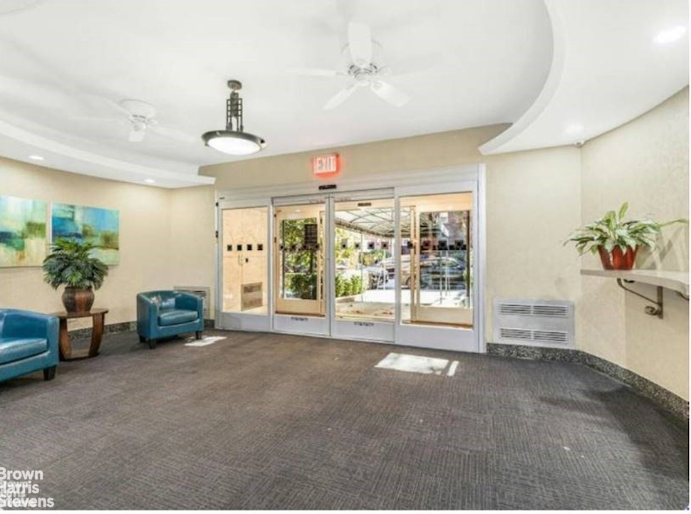 611 West 239th Street, Unit 3F Bronx, NY 10471 - Photo 9 of 12 a view of livingroom with furniture and windows