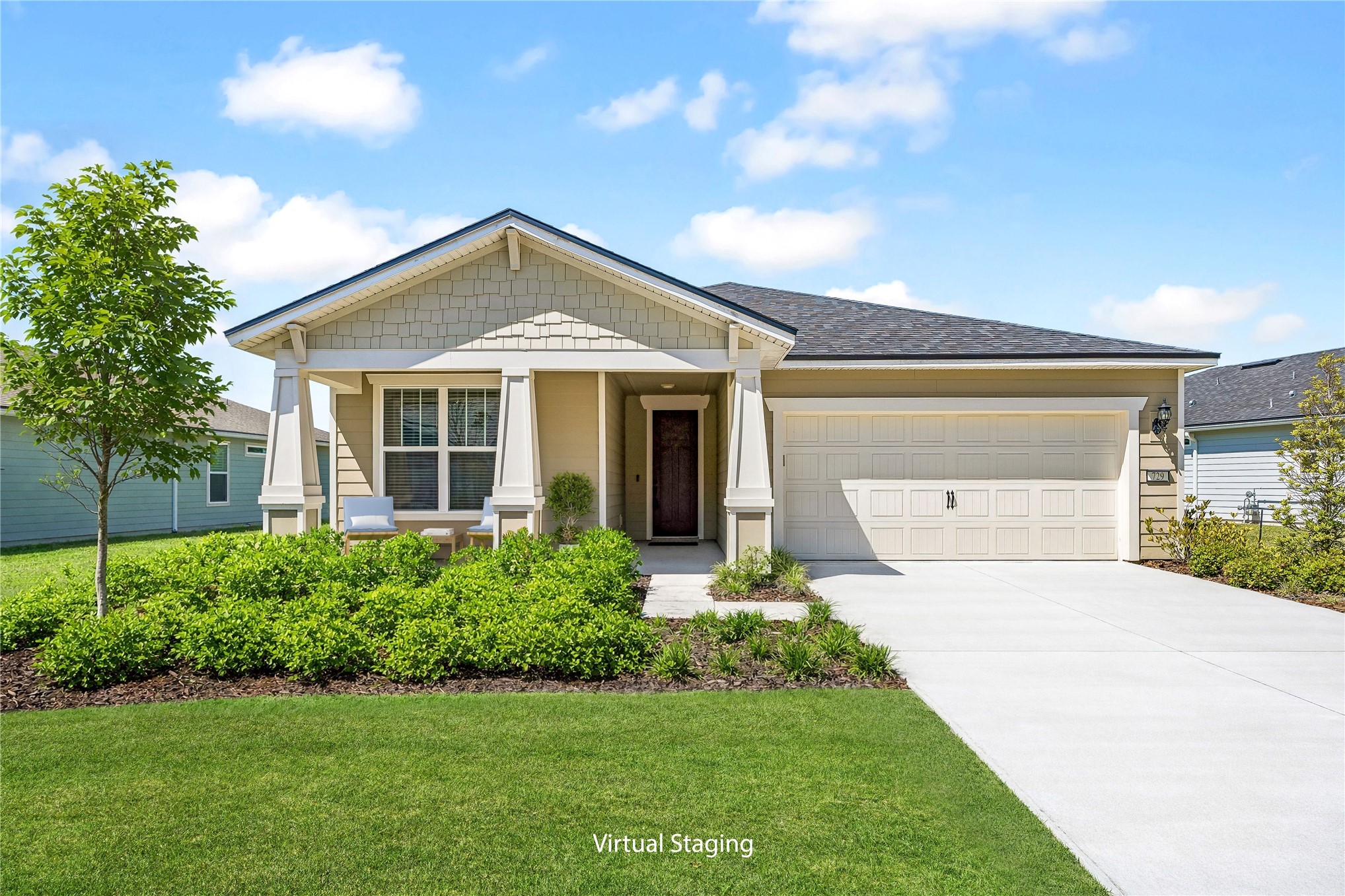 Welcome to 729 Continuum Loop! Virtually Staged Porch and Yard.