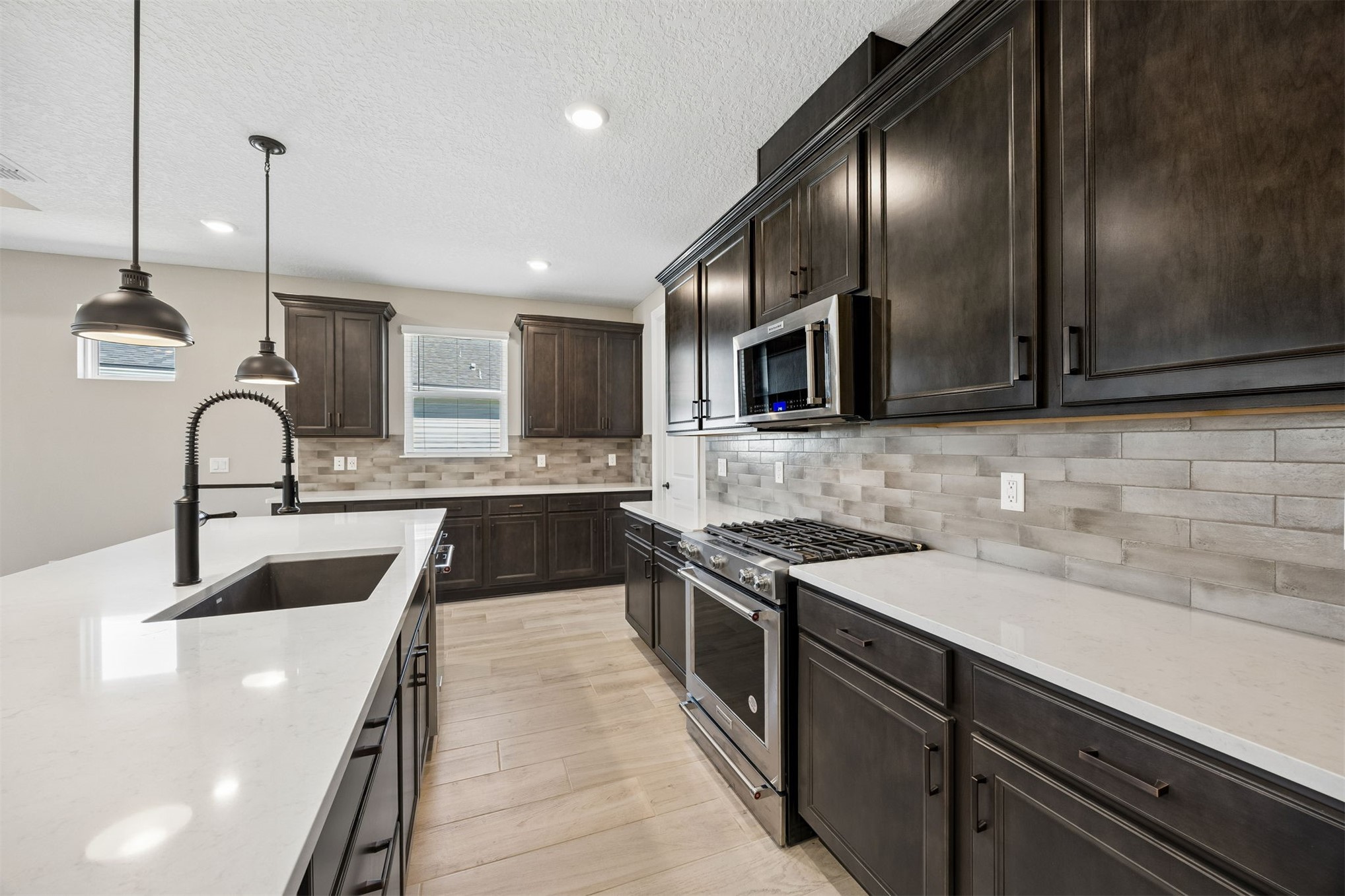 729 Continuum Loop Yulee, FL 32097 - Photo 16 of 55 Thoughtfully laid out kitchen.