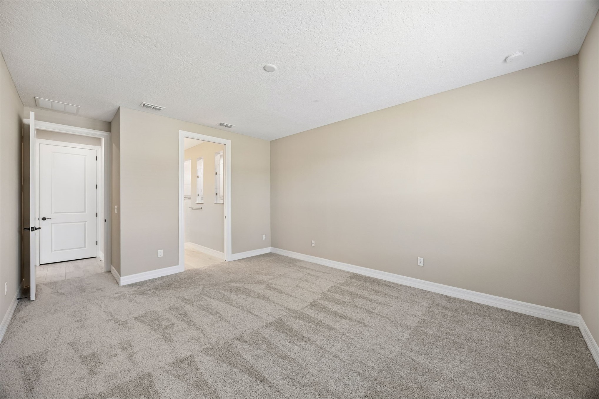 729 Continuum Loop Yulee, FL 32097 - Photo 21 of 55 Pimary bedroom has ensuite and large closet.