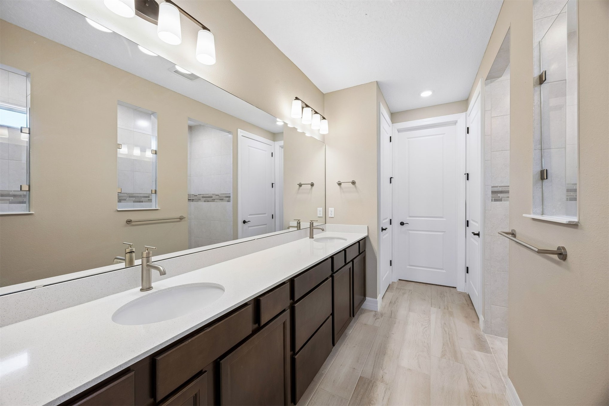 729 Continuum Loop Yulee, FL 32097 - Photo 23 of 55 Primary bathroom with double sinks and,