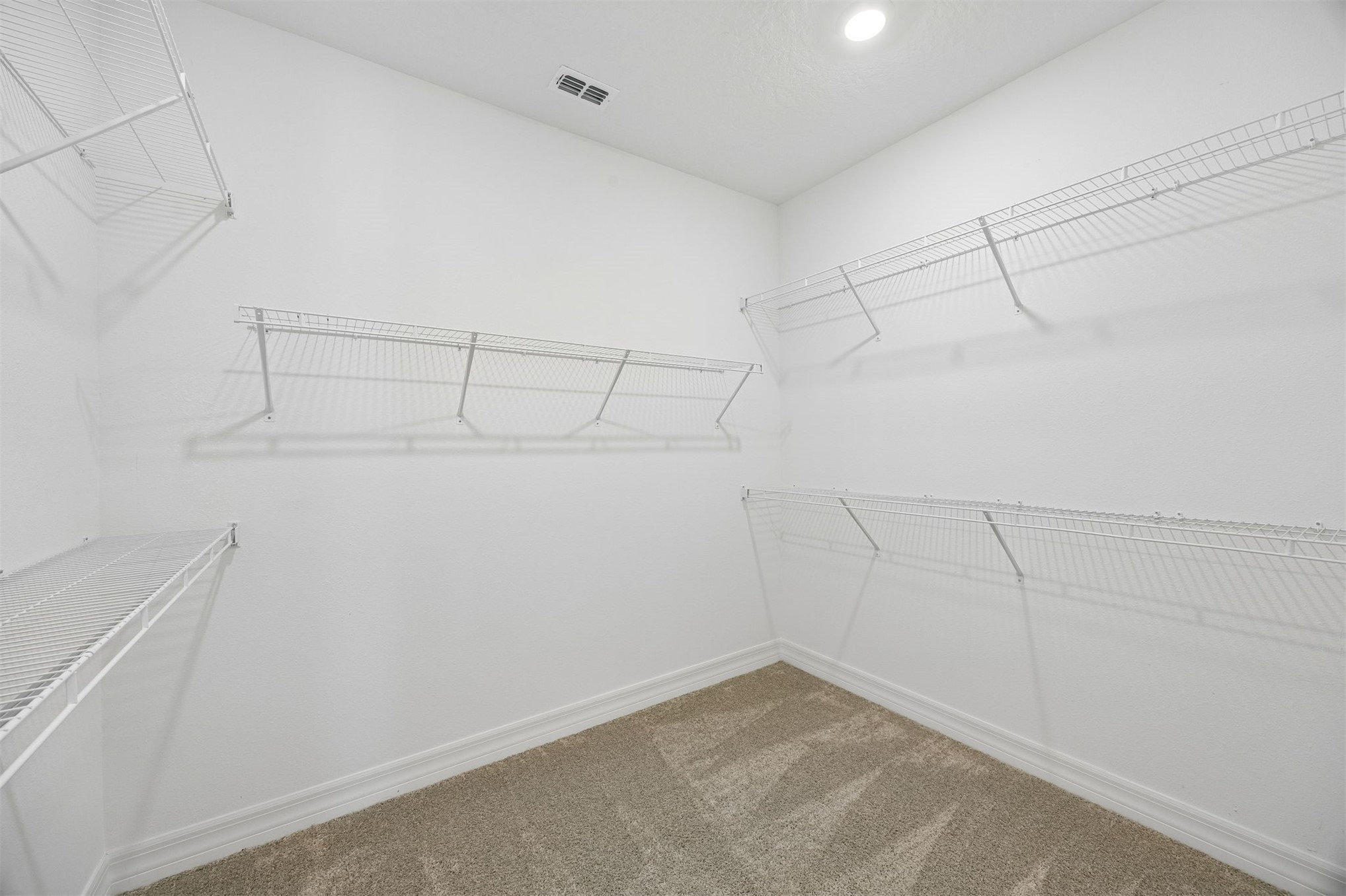 729 Continuum Loop Yulee, FL 32097 - Photo 25 of 55 Large primary closet.