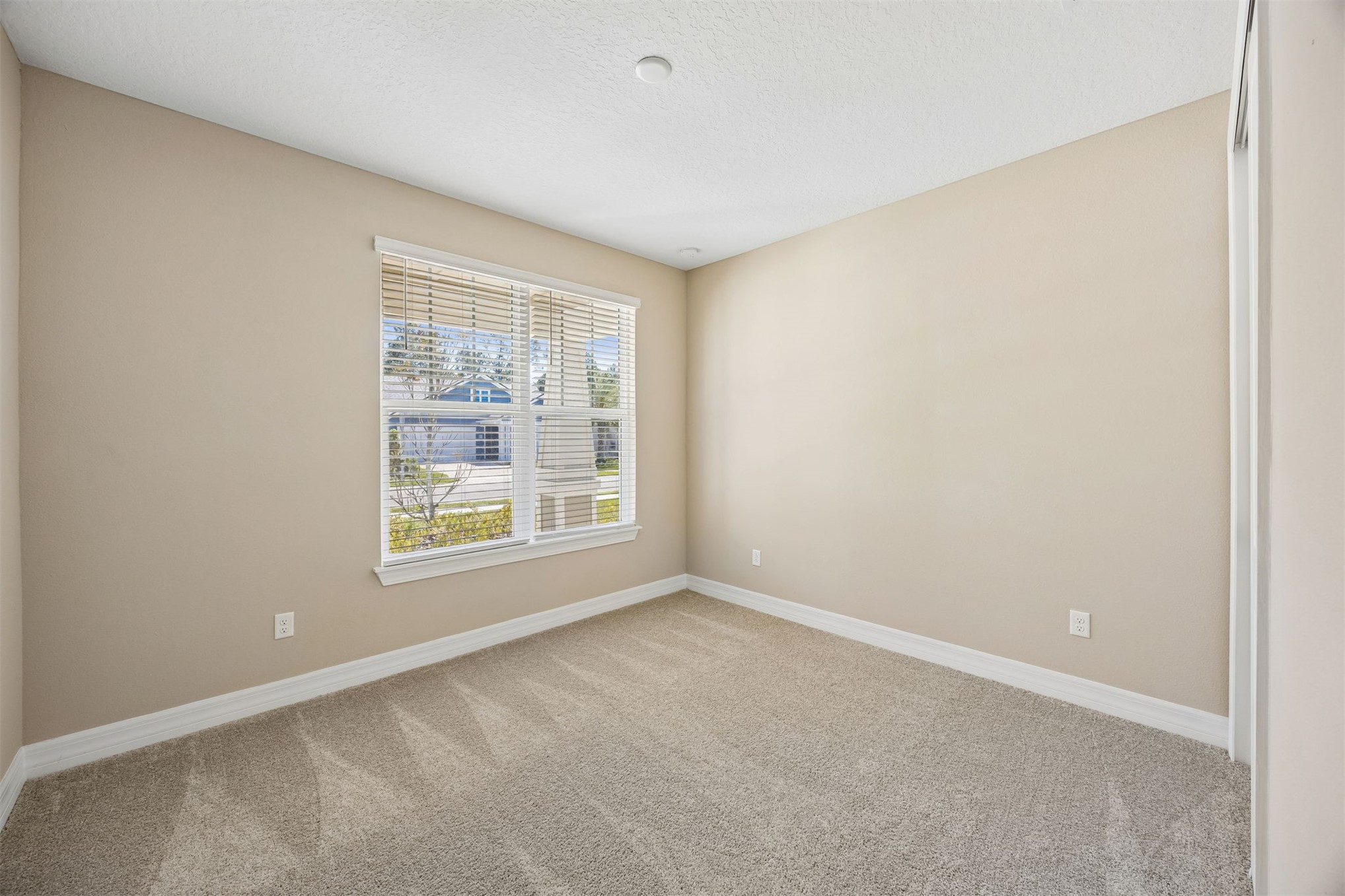 729 Continuum Loop Yulee, FL 32097 - Photo 26 of 55 Private second bedroom.