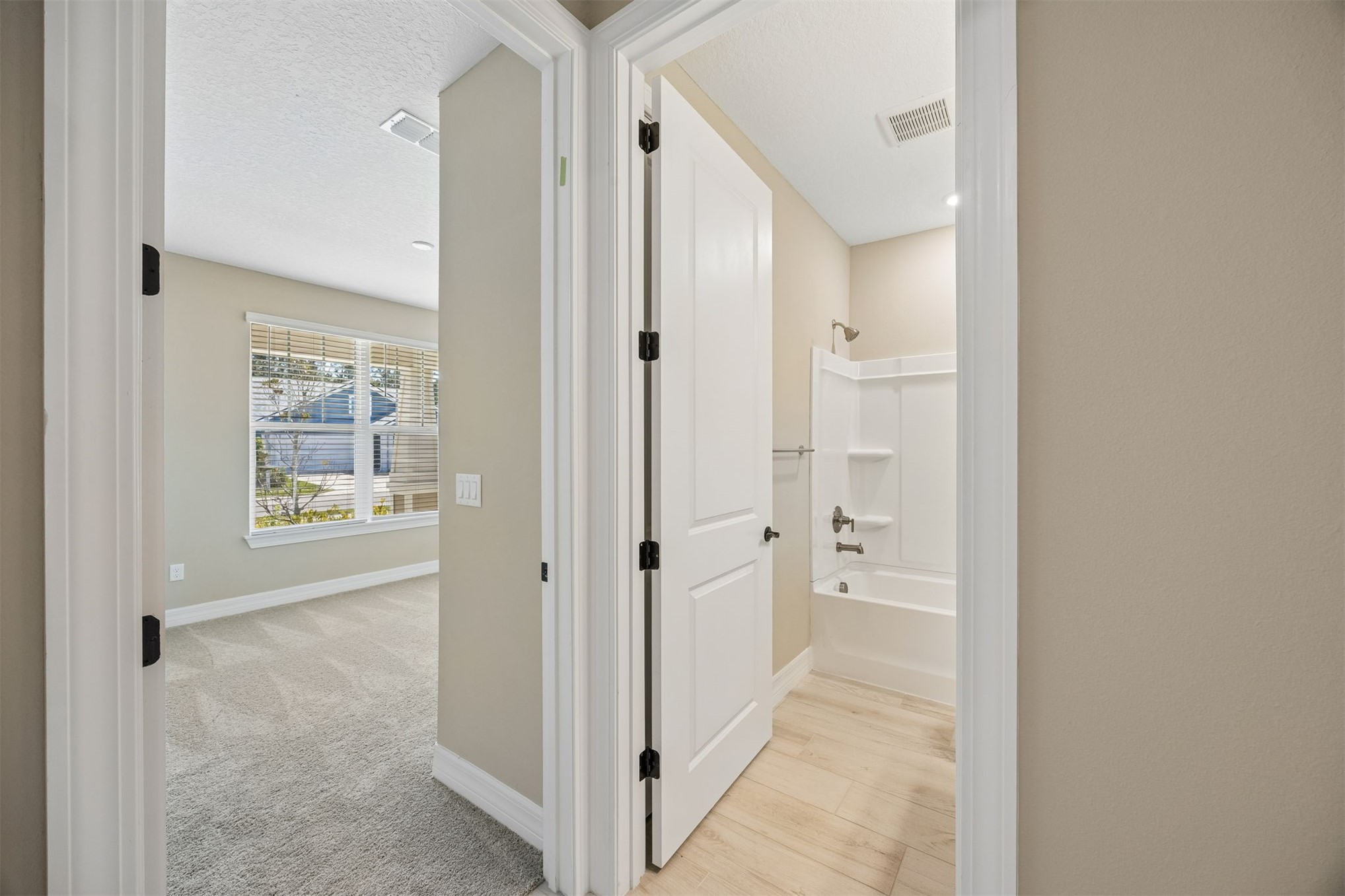 729 Continuum Loop Yulee, FL 32097 - Photo 29 of 55 Second bedroom and easy access to bathroom for guests or family.