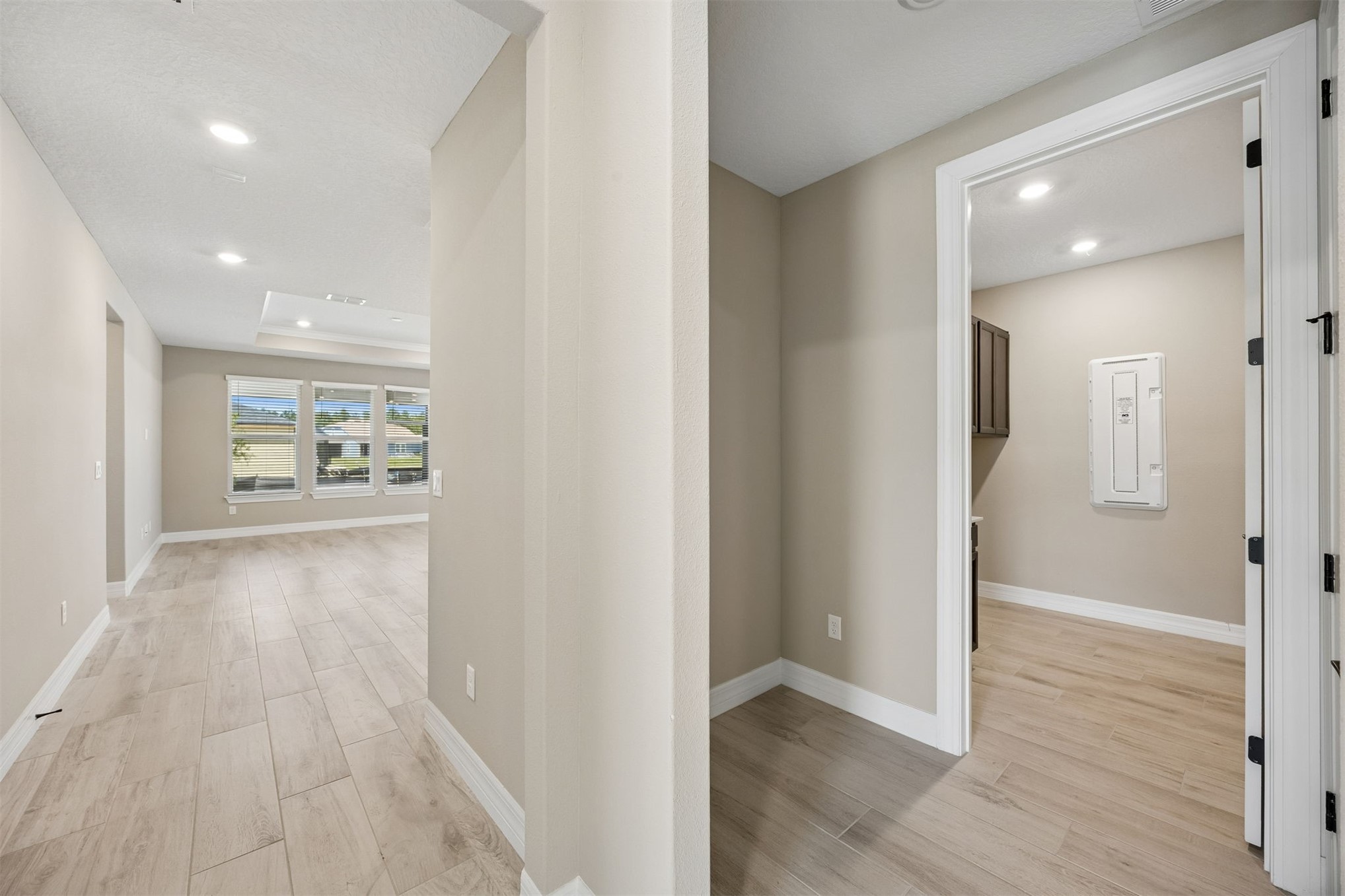 729 Continuum Loop Yulee, FL 32097 - Photo 32 of 55 Next to the laundry room is the perfect Drop Zone. Waiting for you to make it your own.