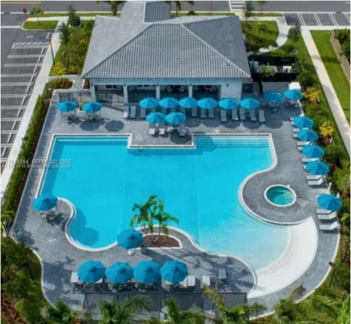 an aerial view of a house with outdoor space