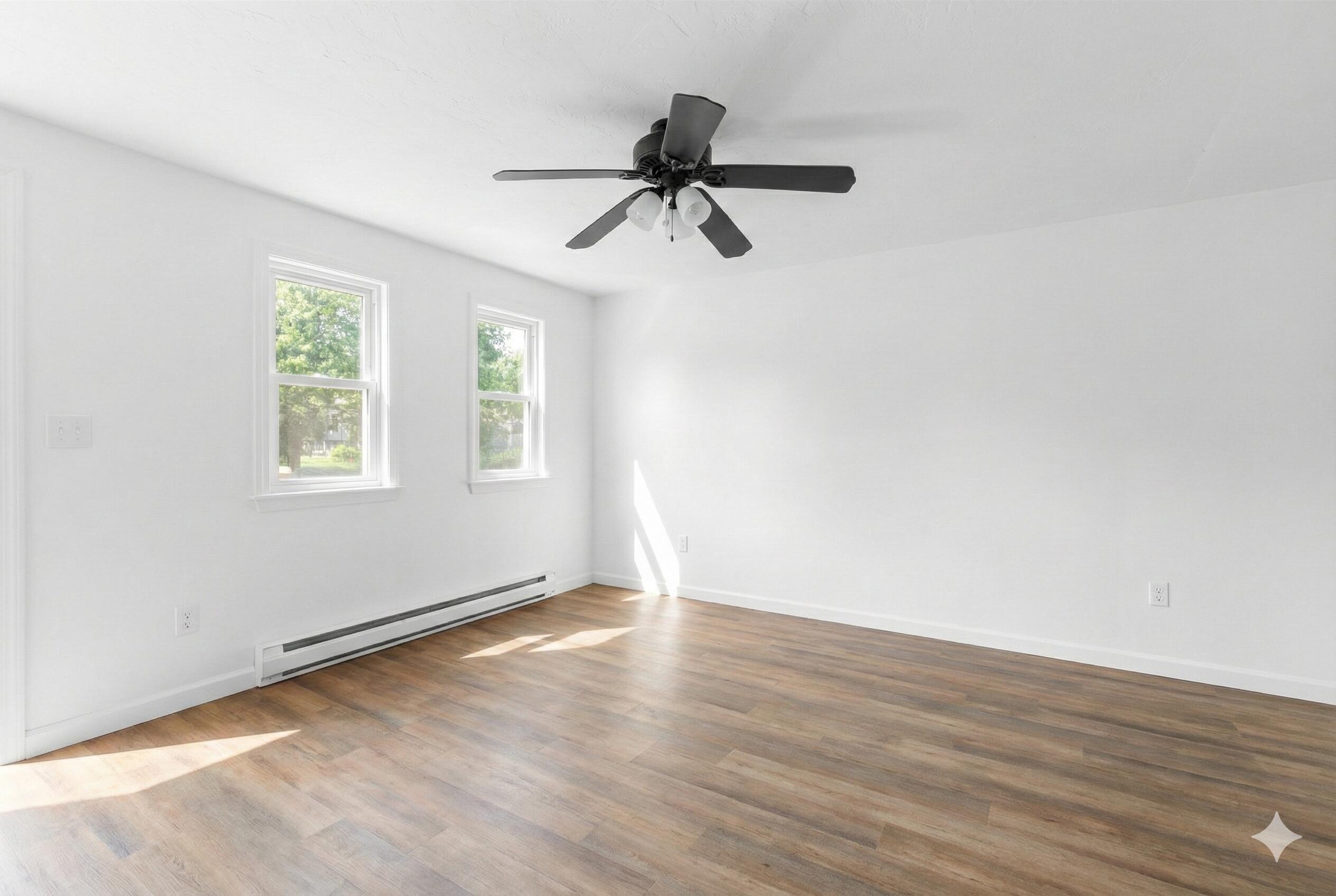 300 Falmouth Road, Unit 20C Mashpee, MA 02649 - Photo 16 of 38 wooden floor in an empty room with a window