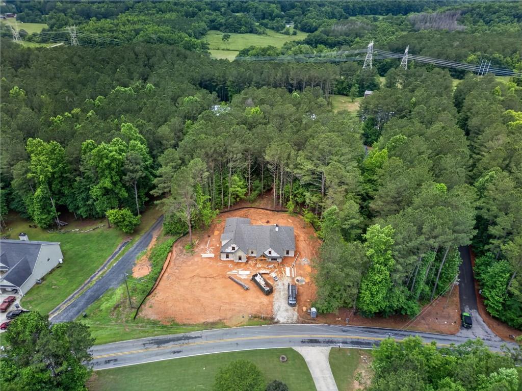 1698 Tibbitts Road Dallas, GA 30132 - Photo 12 of 16 an aerial view of a house with a yard