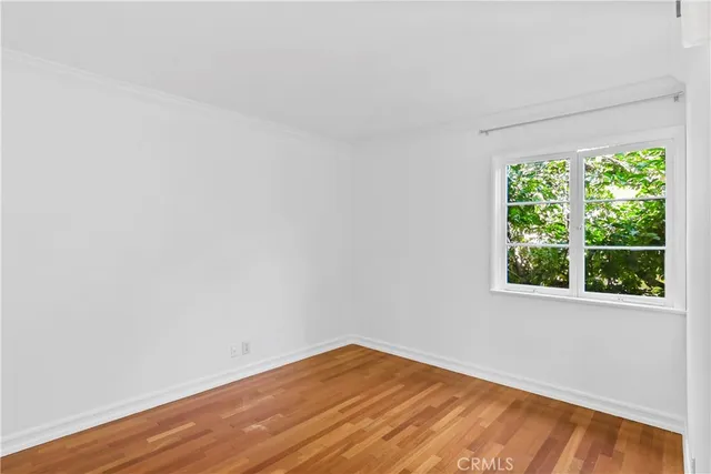 a kitchen with stainless steel appliances granite countertop a stove a refrigerator and a microwave