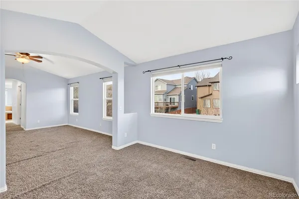 an empty room with windows