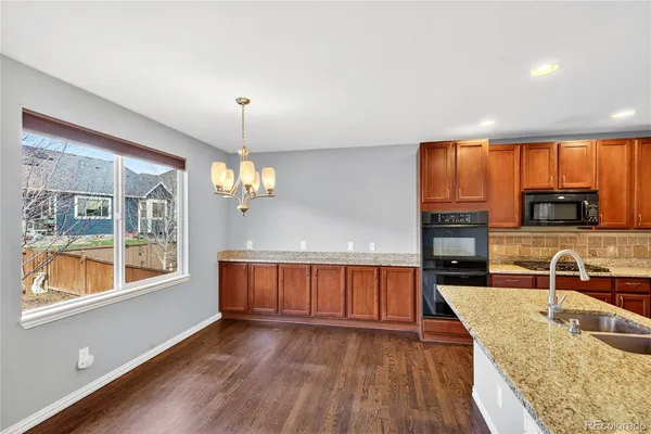a kitchen with sink and window