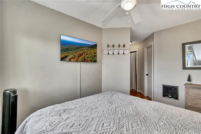 a bathroom with a toilet sink and vanity