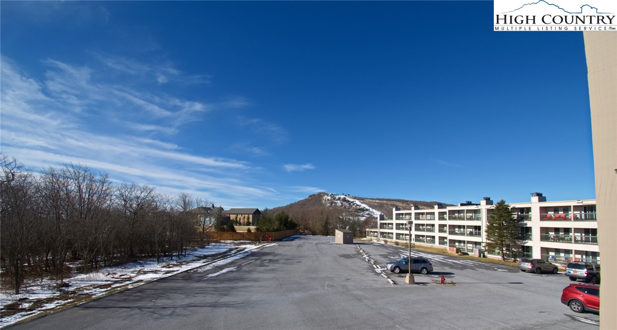 301 Pinnacle Inn Road, Unit 1215 Banner Elk, NC 28604 - Photo 32 of 47 a city view with tall buildings