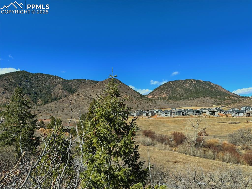4405 Diamondback Drive Colorado Springs, CO 80921 - Photo 6 of 21 a view of mountain with sunset in background