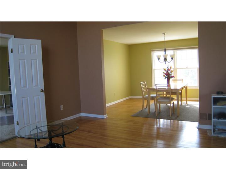 5 Millar Court West Windsor, NJ 08550 - Photo 14 of 17 a kitchen with a table chairs and a dining table