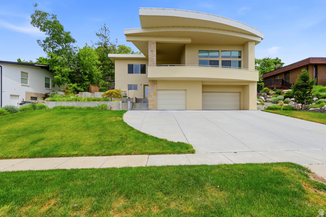 1389 Millbrook Way Bountiful, UT 84010 - Photo 2 of 74 Contemporary stucco exterior featuring a curved upper facade