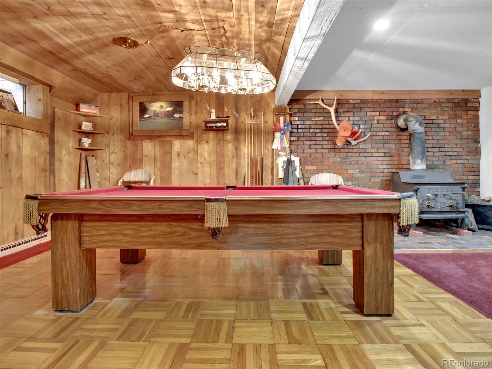 651 Lindsey Road Golden, CO 80401 - Photo 22 of 40 a bathroom with a sink and a mirror