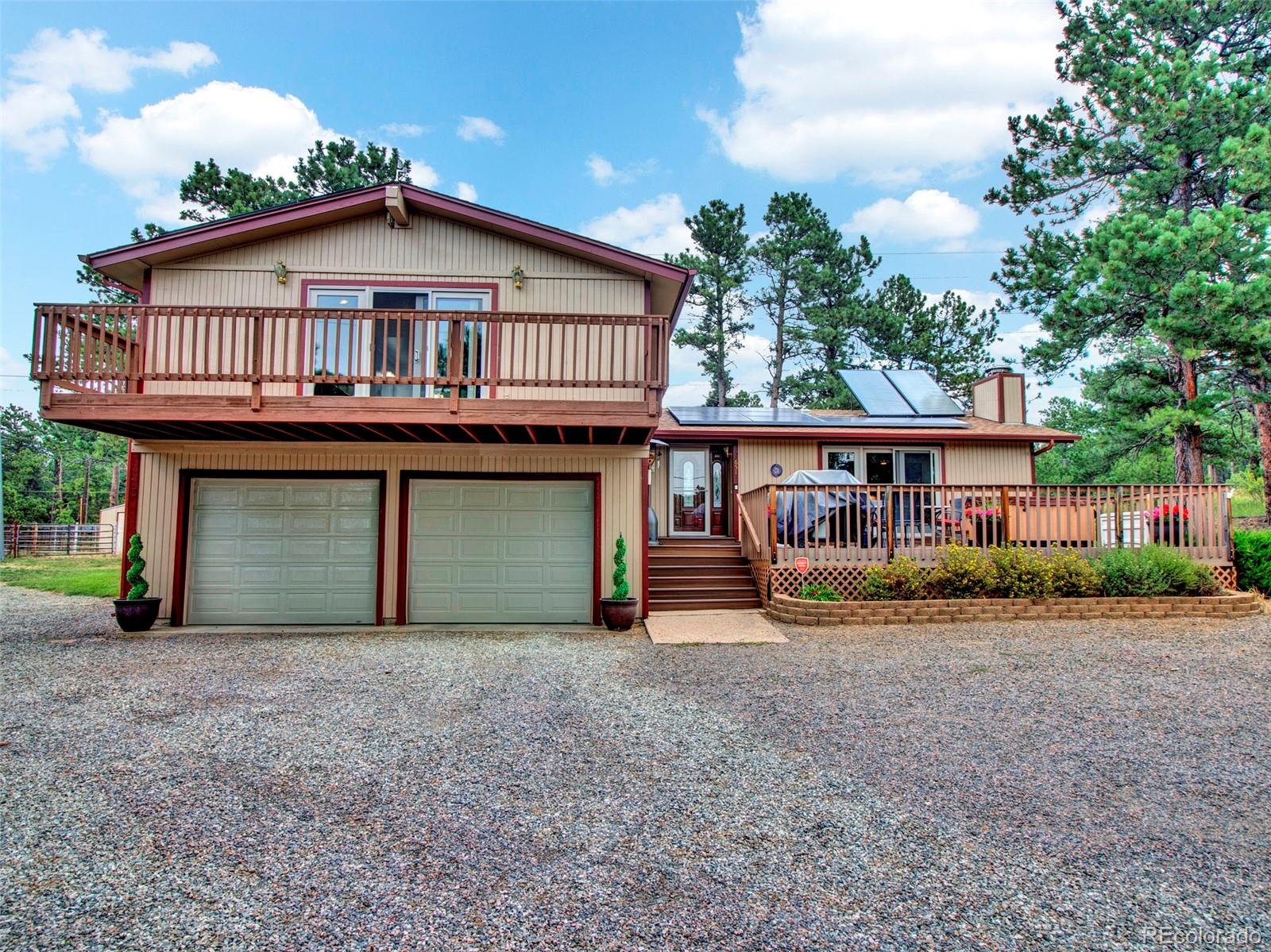 651 Lindsey Road Golden, CO 80401 - Photo 28 of 40 a front view of a house with garden