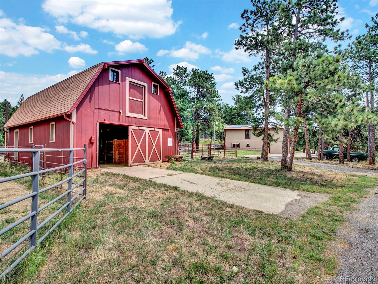 651 Lindsey Road Golden, CO 80401 - Photo 36 of 40 a front view of a house with a yard