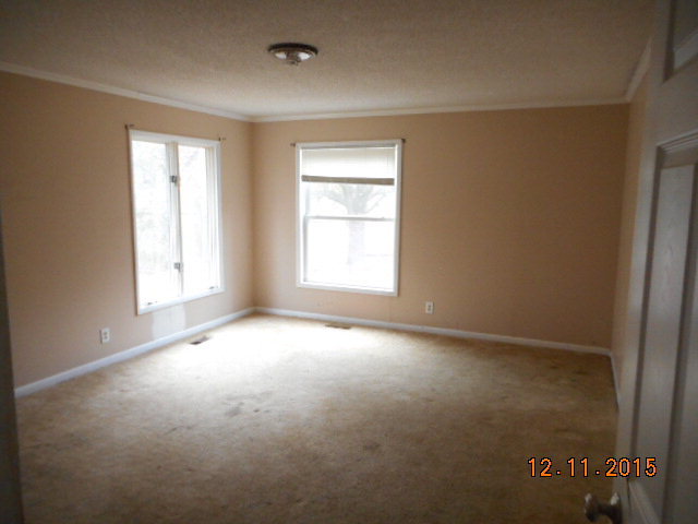 7331 Quail Run Road Lizella, GA 31052 - Photo 15 of 23 an empty room with windows